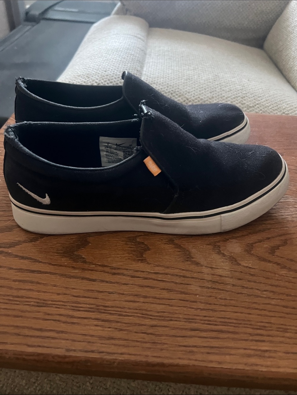 Nike Black and White Slip-On Canvas Sneakers